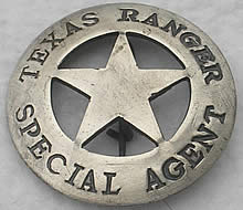 A silver circle star badge with the words "Texas Ranger" across the top of the circle and "Special Agent" across the bottom.