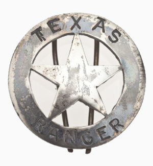 A silver circle star badge with the word "Texas" across the top and "Ranger" across the bottom.