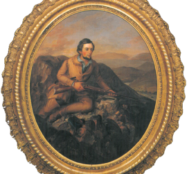 Circular framed painting of man posing on a rock with a rifle in his hand.