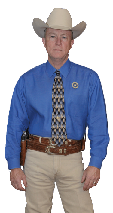 Ranger Cawthon in blue shirt and khaki pants uniform