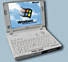 white 1990s laptop