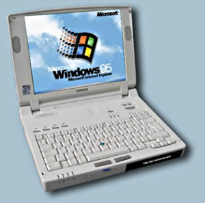 white 1990s laptop