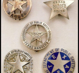 Five badges on a white background. One is star shaped, the rest are circle star shaped. One circle star shaped badge has a dark blue background.