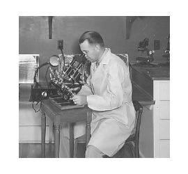 looking in an early microscope