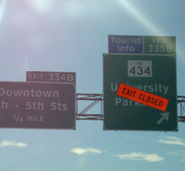 exit closed highway sign