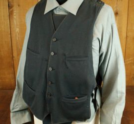 soft black vest with 5 buttons and 4 pockets