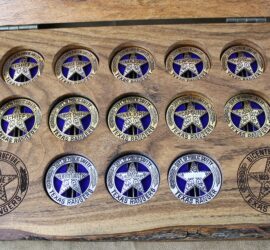 set of Ranger badges in wood display case