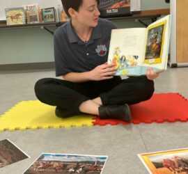 lady reading horse story in classroom