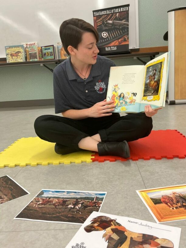 lady reading horse story in classroom