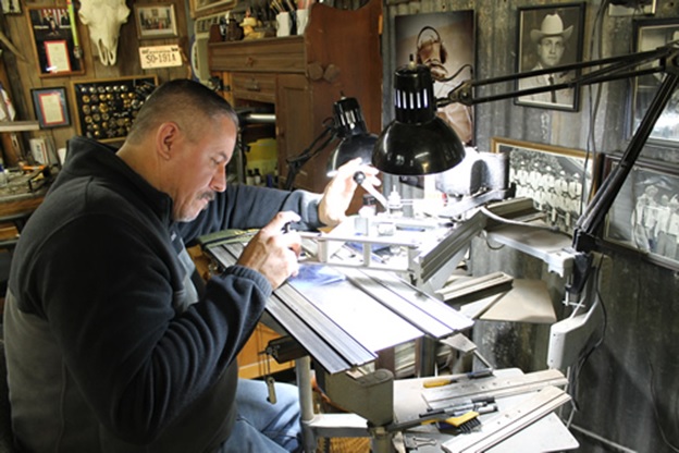 Silversmith Kevin Johnson at his jeweler's bench