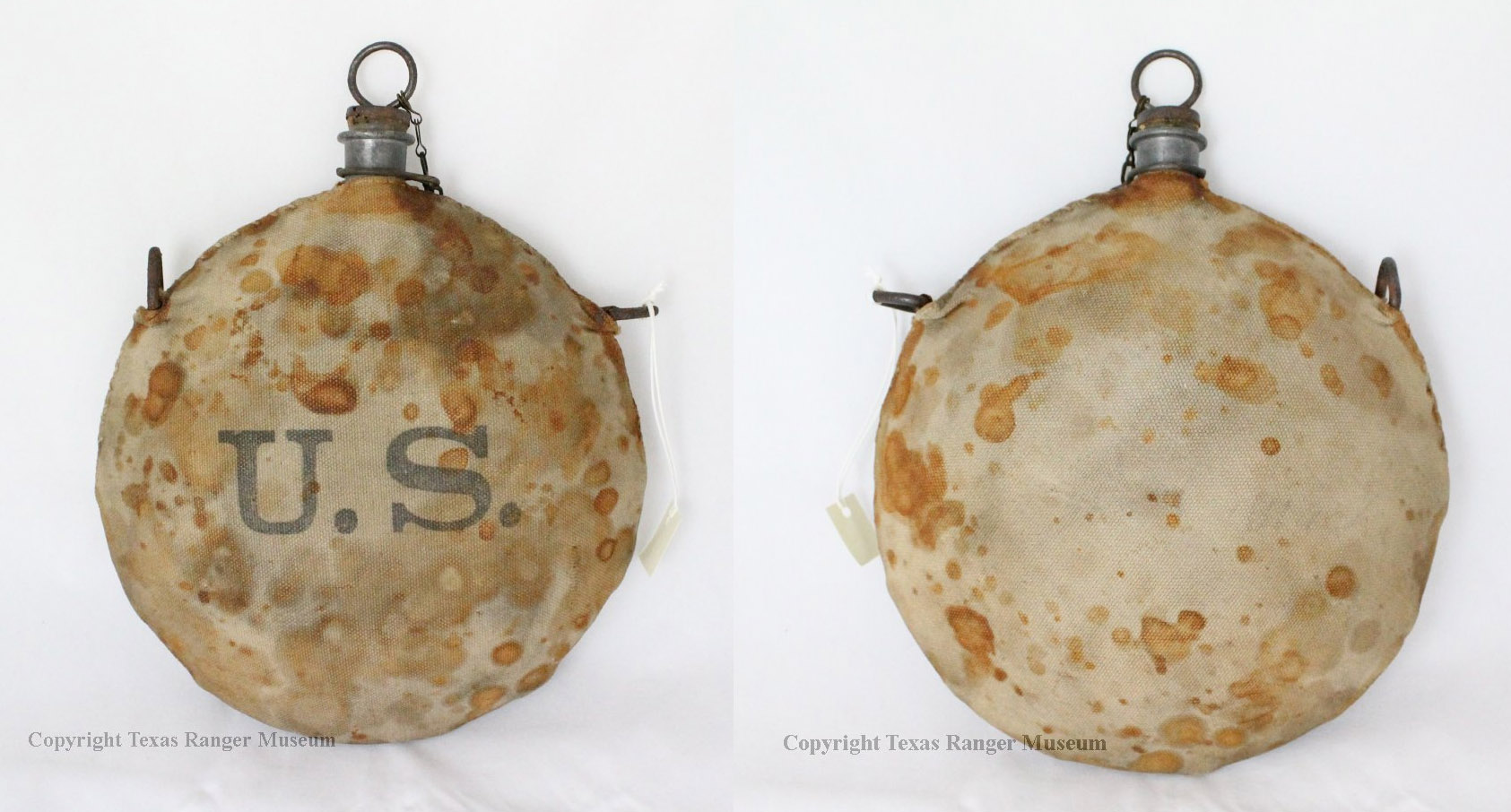 Round canteen with stained brown canvas wrapping and gray U.S. lettering on front