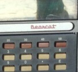 rows of rectangular push buttons on a bearcat branded machine