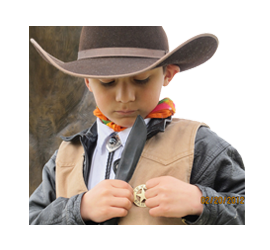 Photograph of child wearing badge